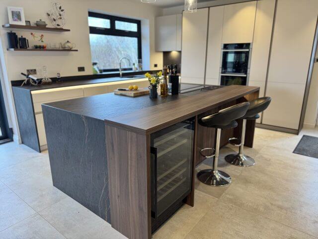 Modern kitchen with wood-effect island, wine cooler and integrated appliances